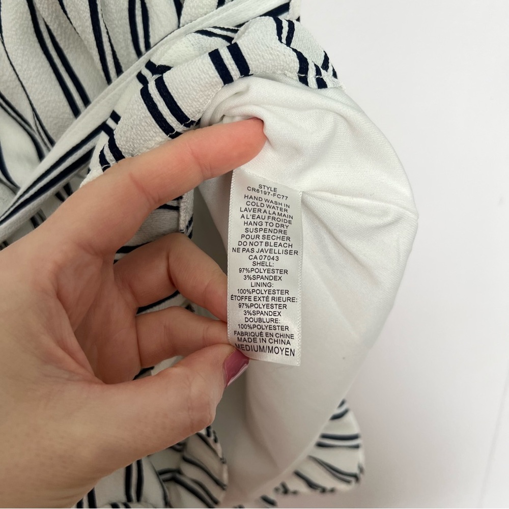 White and black striped shorts romper with ruffle detail - Picture 12 of 12